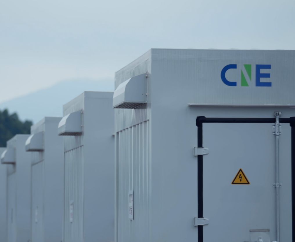 Row of energy storage containers with logos